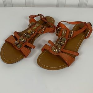 Diba Style burnt orange opened toed sandals with adjustable strap in back. 7.5M